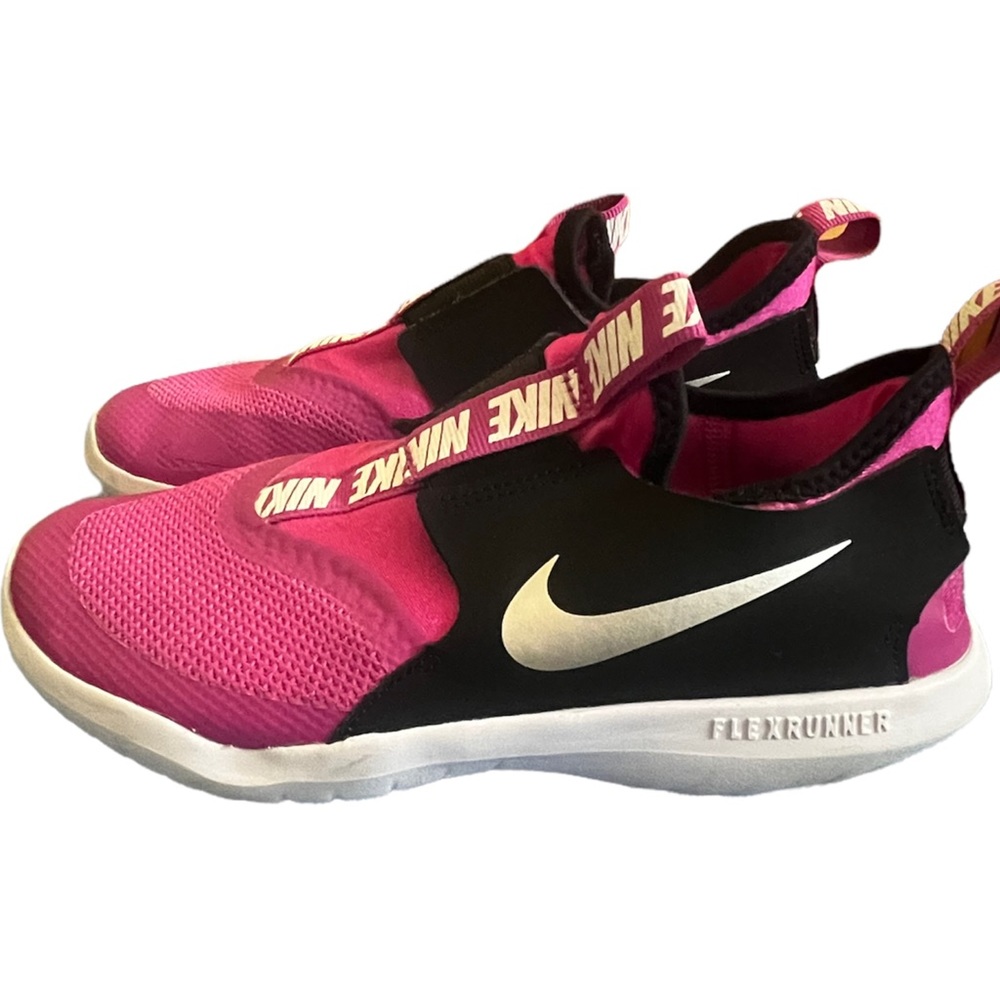 Kids pink Nike shoes